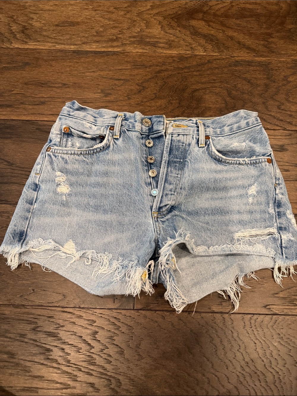 Agolde Light Blue Distressed Button-Fly Denim Shorts